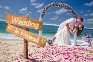 wedding couple just married near the beach at Hawaii with copy space for text